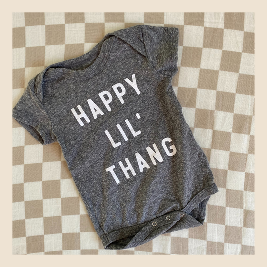 HAPPY LIL' THANG SMILEY ONESIE