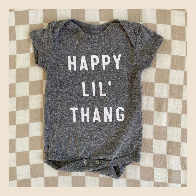 HAPPY LIL' THANG SMILEY ONESIE